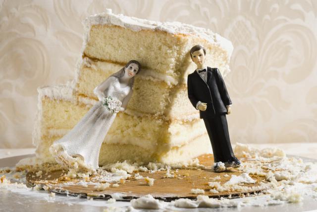 Wedding cake visual metaphor with figurine cake toppers