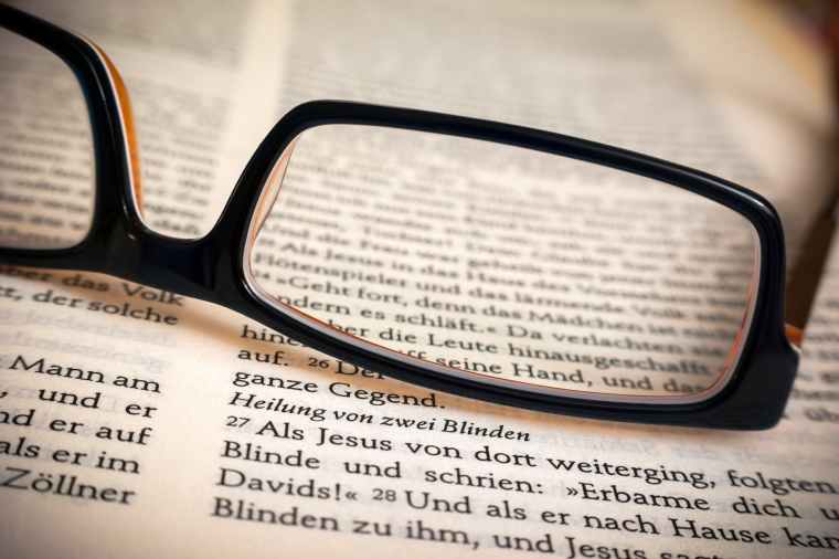 bible book close up eyeglasses